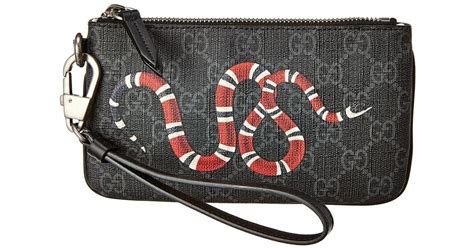 gucci supreme snake pouch|gucci kingsnake print.